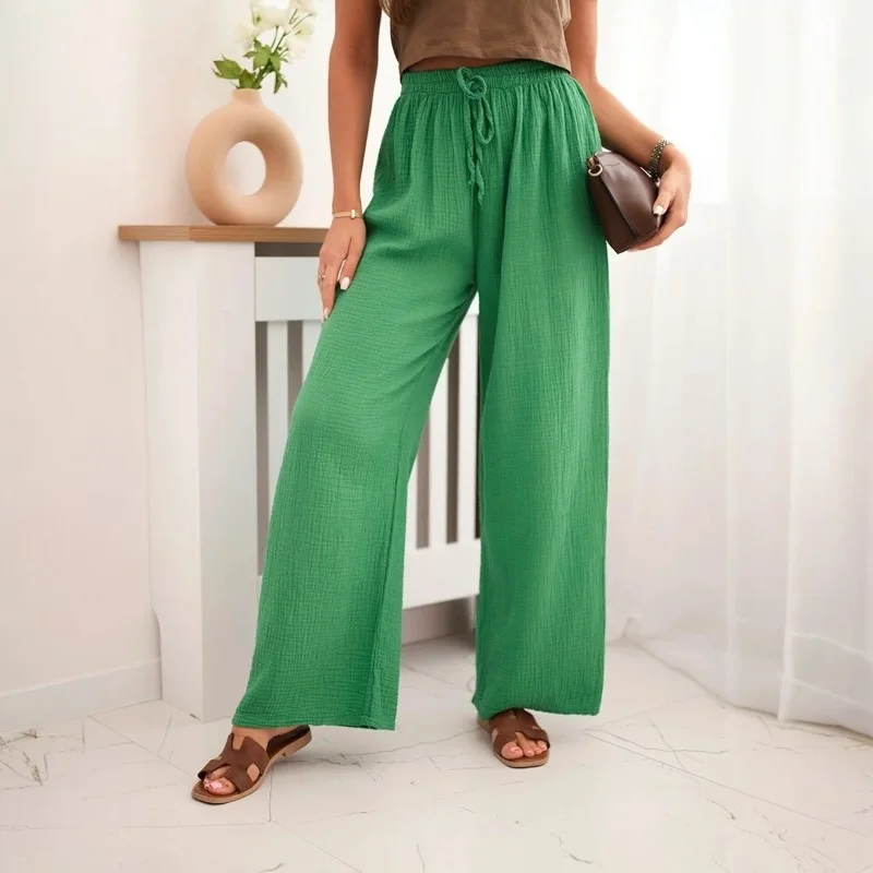 SAMBA - mušelínové kalhoty - kiwi, velikost sedne od S do L